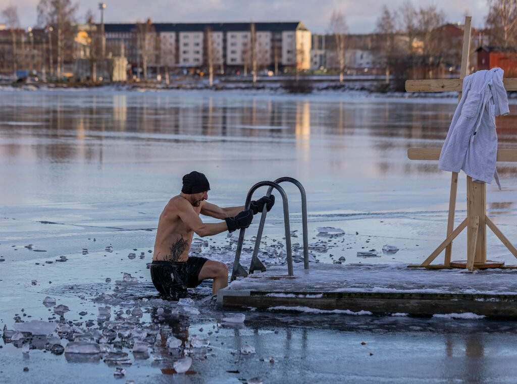Shirtless man in freezing lake near Ludvika, Sweden, captured during a winter swim. Sublime ice scenery. How to Set Up an Ice Bath at Home (Step-by-Step for Any Budget)